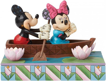 Mickey Mouse y Minnie enamorados en un bote